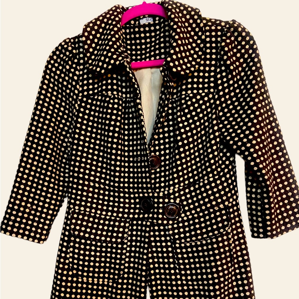 This 3/4 sleeve jacket is made by zinc size small